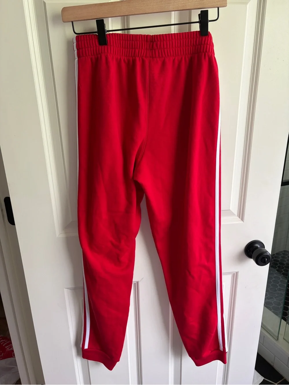adidas Red size 14/16 Joggers with White Side Stripes. Like new! Soft. Sporty.
